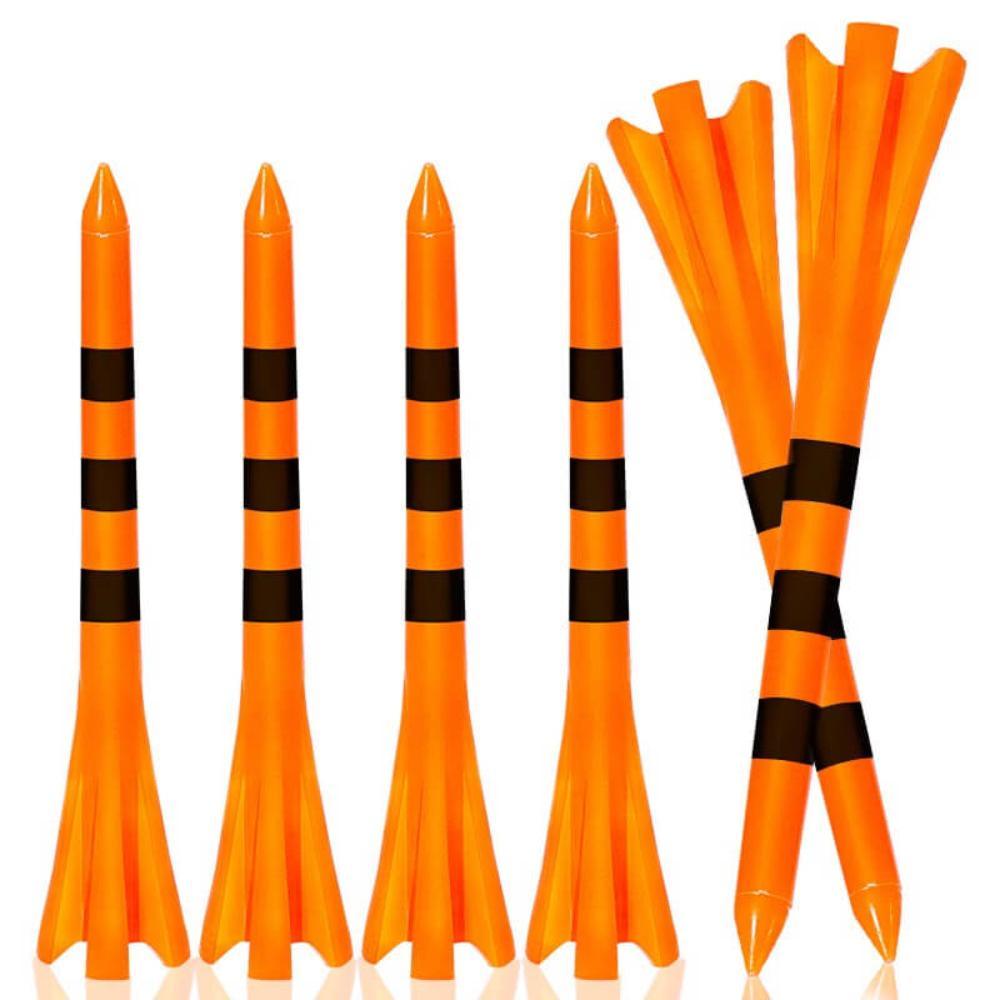 some orange/black striped plastic golf tees